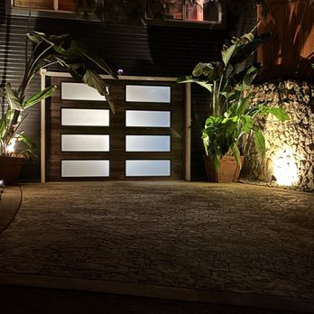 New glass panel garage door (night view)