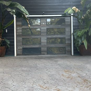 New glass panel garage door (day view) In "barn wood"