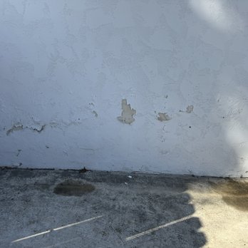 Before: Garage back wall