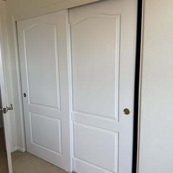 Sliding closet doors finally fixed, holes repatched and painted. Looks brand new again!