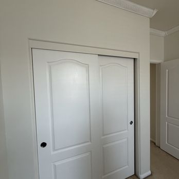 Sliding closet doors finally fixed, holes repatched and painted. Looks brand new again!