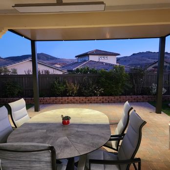 Photo from inside of our California room (which we already had), showing new patio cover with accent lights.