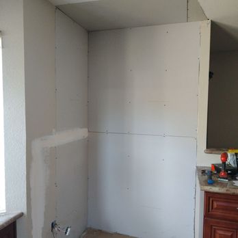 Before picture of drywall done by owner. We also attempted to mud and tape. Then we called West Coast to do it correctly.